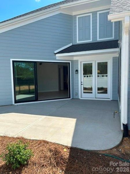 Exterior details and patio area of a home in The Courtyards at Hodges Farm, Charlotte (Image 19).