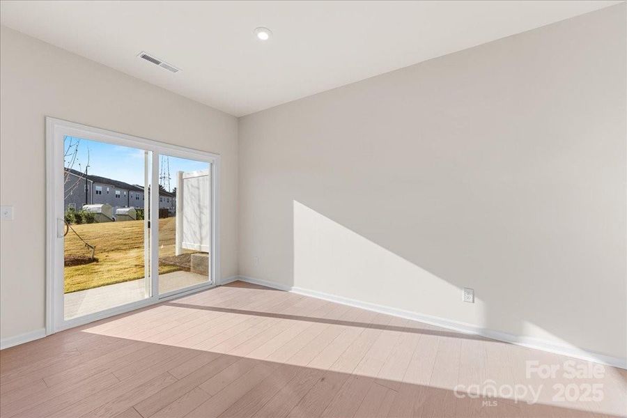 Large Sliding Doors Leading to Outdoor Living Space. Large Sliding Doors Leading to Outdoor Living Space.