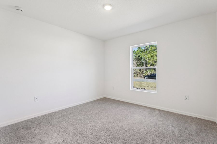 Spacious, unfurnished interior of a new home in Vero Lake Estates, Vero Beach (Image 19).