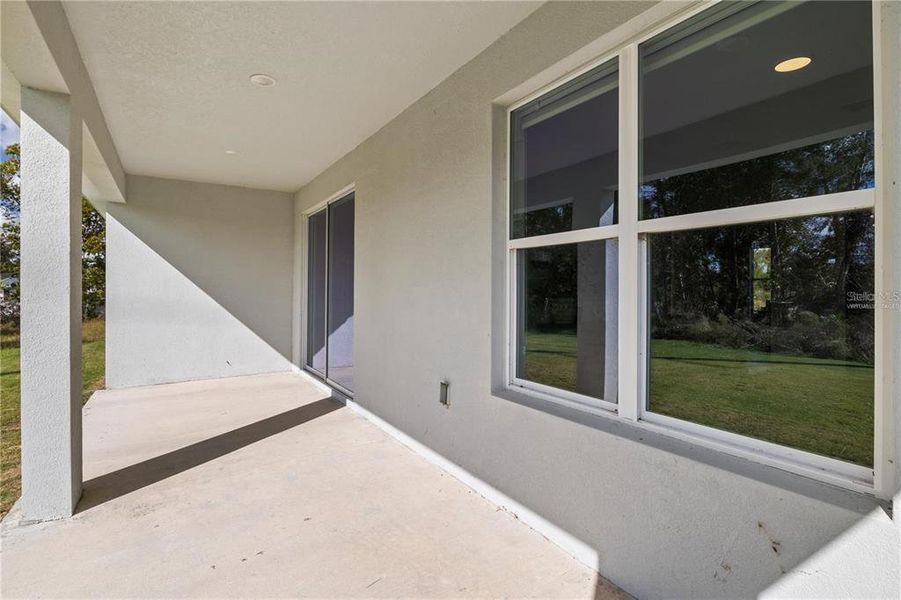 Exterior details and patio area of a home in , Ocala (Image 3).
