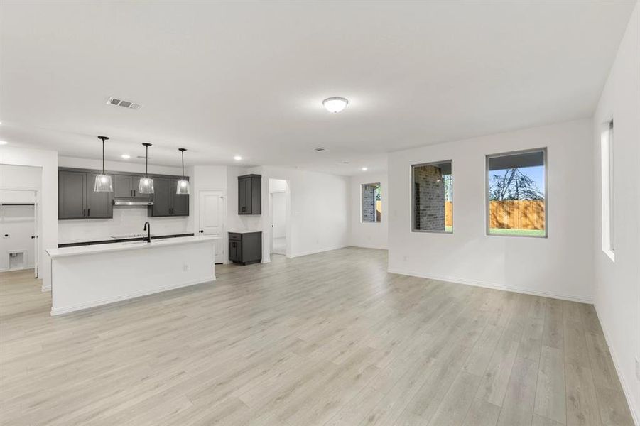 Open Kitchen-Living-Dining Room featuring the Minimalist Collection Open Kitchen-Living-Dining Room featuring the Minimalist Collection