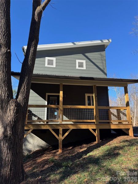 Back porch, covered deck, back door entrance at kitchen Back porch, covered deck, back door entrance at kitchen