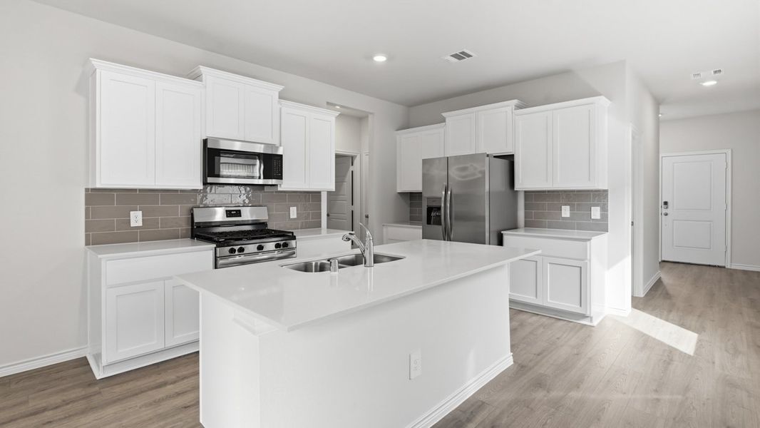 Representative furnished interior of a home built from the Jackson by D.R. Horton in Silverado, Aubrey (Image 4).