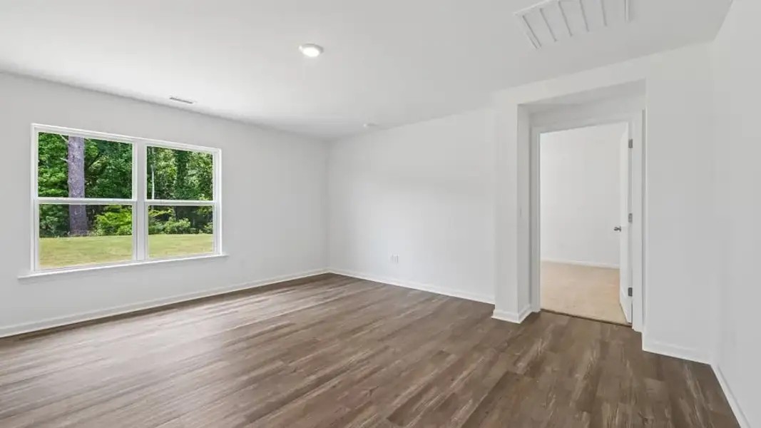 Spacious, unfurnished interior of a new home in Mangum Farms, Stem (Image 23).