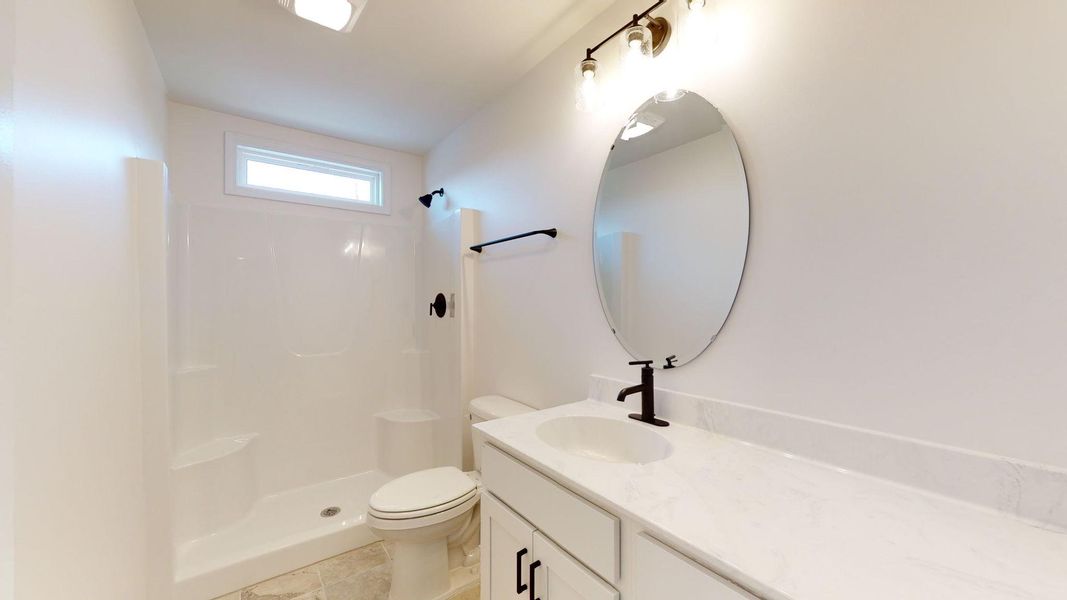Representative furnished interior of a home built from the Catherine A by JC Jackson Homes,LLC in Heritage Pointe, Newport (Image 15).