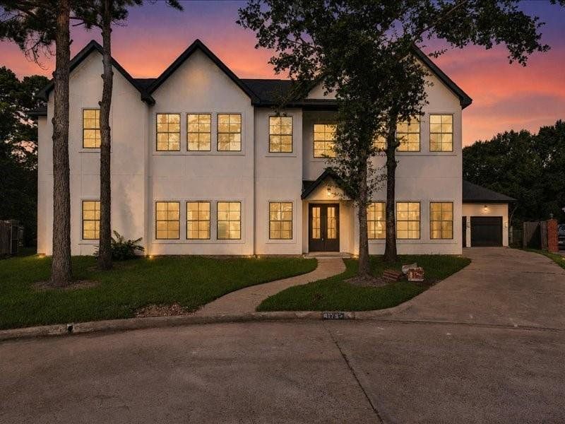 Front exterior of a new home in , Spring, TX, highlighting curb appeal (Image 25). Front exterior of a new home in , Spring, TX, highlighting curb appeal (Image 25).