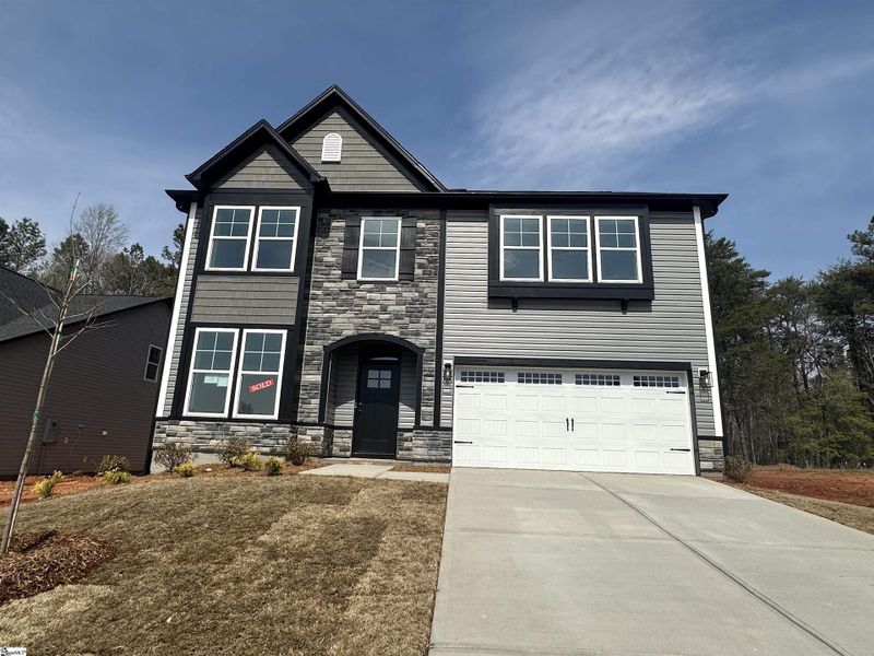 Front exterior of a new home in Shiloh Trail, Wellford, SC, highlighting curb appeal (Image 19).