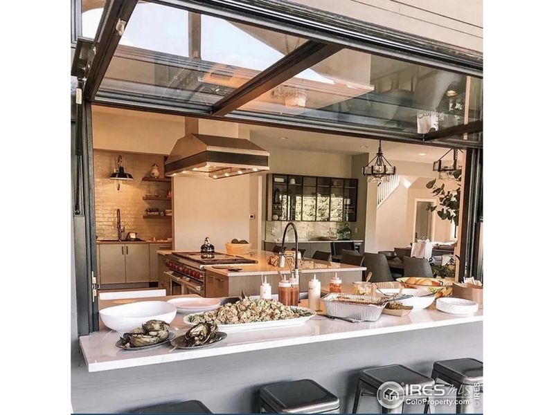 CONCEPT ONLY - PIC NOT OF ACTUAL HOME. Concept of pass-through window with bar counter from Deck to Kitchen CONCEPT ONLY - PIC NOT OF ACTUAL HOME. Concept of pass-through window with bar counter from Deck to Kitchen