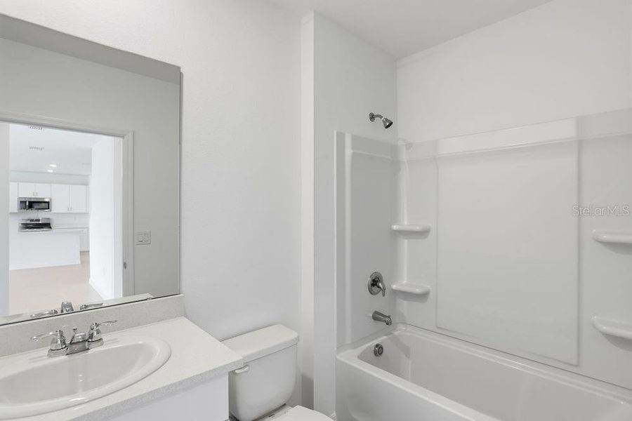 Furnished interior view inside a new home in Waterstone, Groveland (Image 16). Furnished interior view inside a new home in Waterstone, Groveland (Image 16).