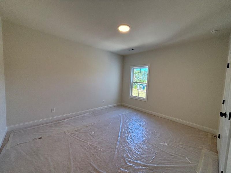 In-progress construction of a new home in Palisades Single Family, Cumming, GA (Image 28).