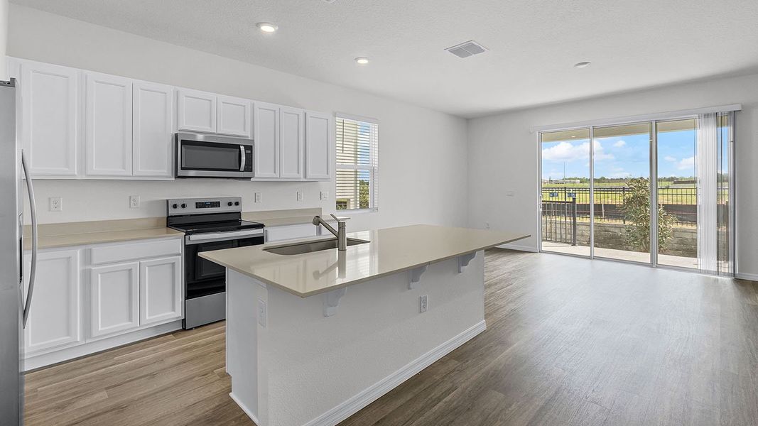 Representative furnished interior of a home built from the VALE by D.R. Horton in Harmony at Lake Eloise, Winter Haven (Image 3).