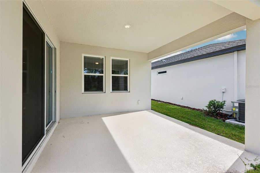 Exterior details and patio area of a home in Ridgehaven - Signature Series, Ormond Beach (Image 21).