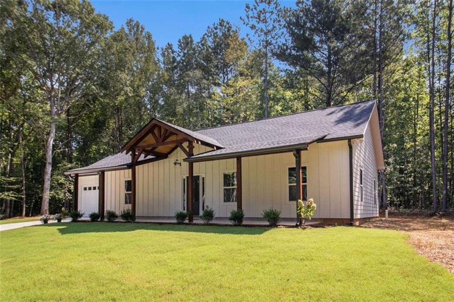 Front exterior of a new home in , Temple, GA, highlighting curb appeal (Image 15).