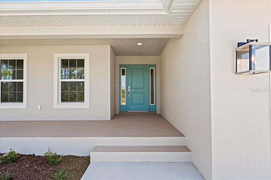Front exterior of a new home in , Rotonda West, FL, highlighting curb appeal (Image 26). Front exterior of a new home in , Rotonda West, FL, highlighting curb appeal (Image 26).