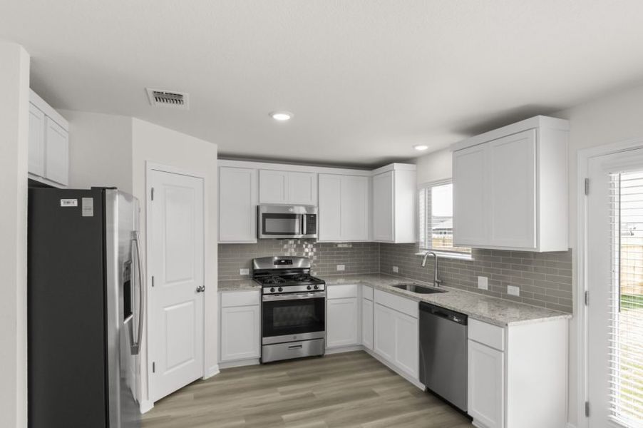 Representative furnished interior of a home built from the Pecan by Pacesetter Homes in Blanco Vista, San Marcos (Image 10).