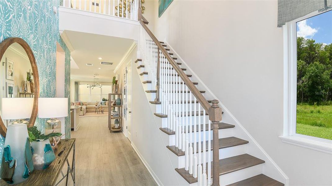 Furnished interior view inside a new home in Harvest at Ovation, Winter Garden (Image 5).