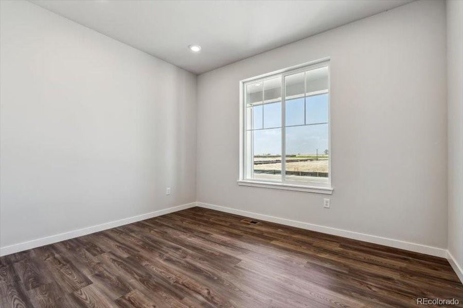 Spacious, unfurnished interior of a new home in Red Barn Meadows, Mead (Image 22).