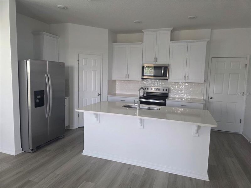 Furnished interior view inside a new home in The Meadow at Crossprairie Bungalows, St. Cloud (Image 13).