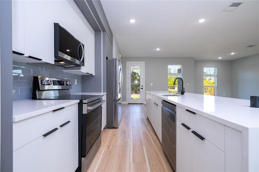 Furnished interior view inside a new home in , Port Charlotte (Image 10). Furnished interior view inside a new home in , Port Charlotte (Image 10).