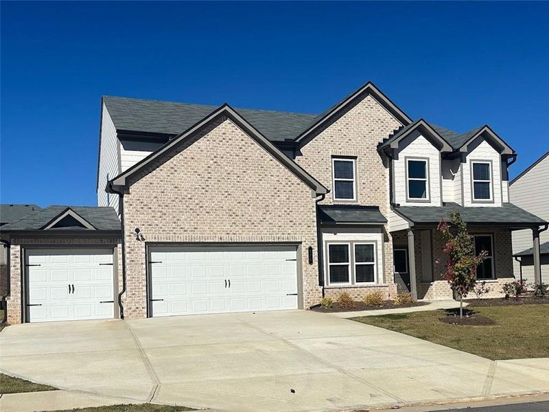 Front exterior of a new home in , Auburn, GA, highlighting curb appeal (Image 16). Front exterior of a new home in , Auburn, GA, highlighting curb appeal (Image 16).