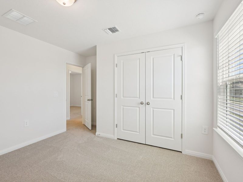 Spacious, unfurnished interior of a new home in Lexington Parke, Del Valle (Image 13).