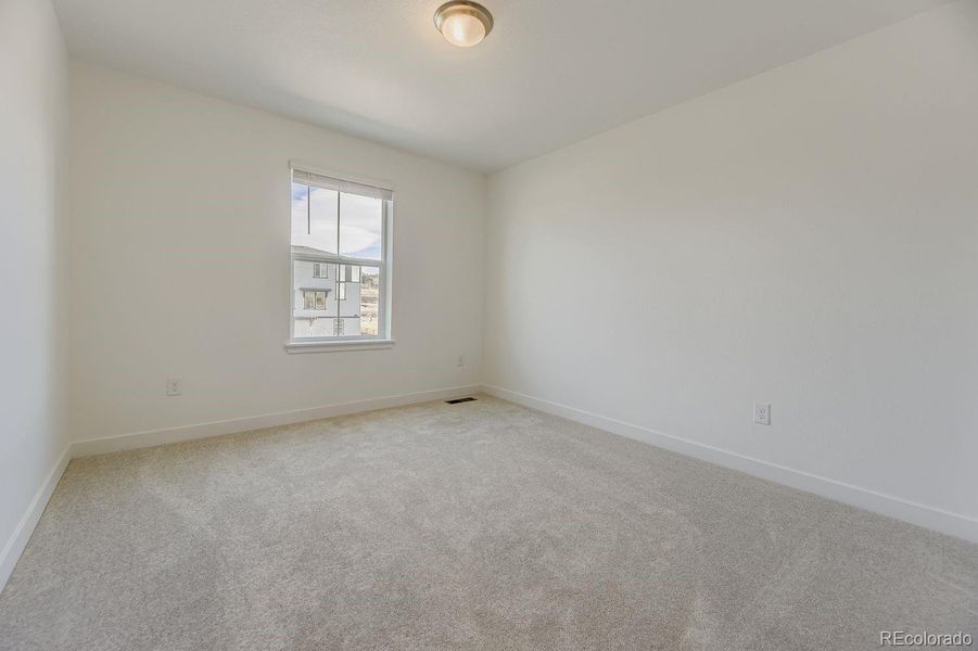 Spacious, unfurnished interior of a new home in Vermilion Creek: The Pioneer Collection, Centennial (Image 9).