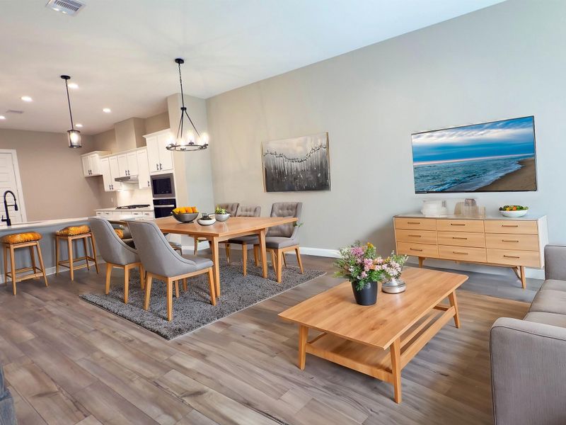 The ROCburne’s living room offers a wall of windows framing the backyard, filling the space with natural light and creating a seamless connection to outdoor living. Image depicts home as-is. The ROCburne’s living room offers a wall of windows framing the backyard, filling the space with natural light and creating a seamless connection to outdoor living. Image depicts home as-is.