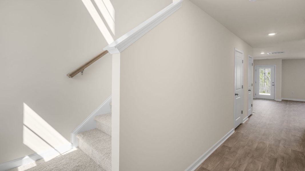 Representative unfurnished interior of a home built from the Pearson by D.R. Horton in The Townes at Ridgewood Farms, Winterville (Image 14).