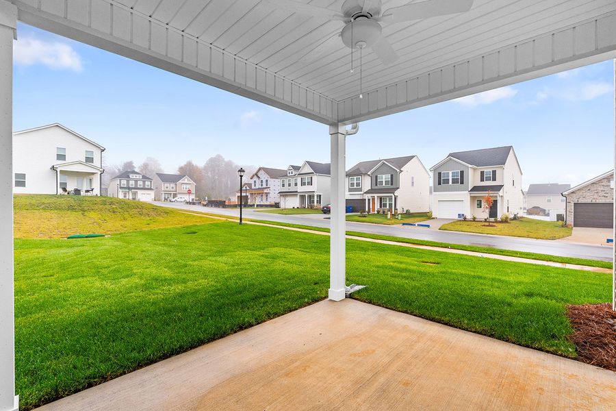 Exterior details and patio area of a home in Hanes Lake, Winston-Salem (Image 3).