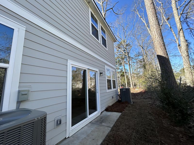 Exterior details and patio area of a home in , Summerville (Image 3).