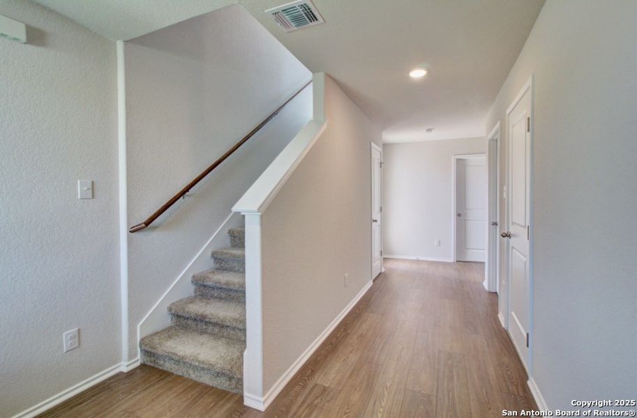 Spacious, unfurnished interior of a new home in Prairie Green, Converse (Image 12). Spacious, unfurnished interior of a new home in Prairie Green, Converse (Image 12).