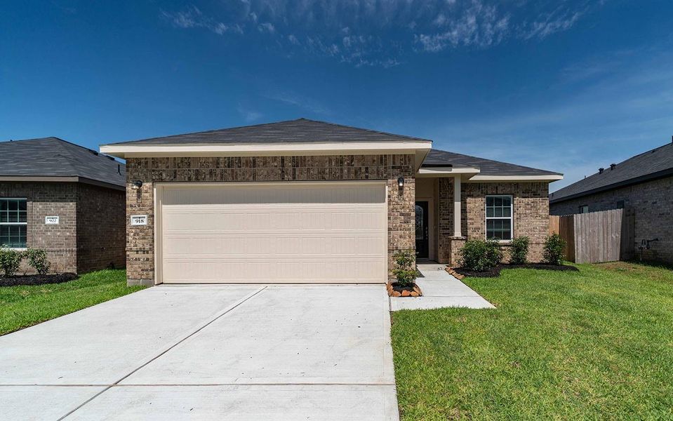 Front exterior of a new home in Pecan Estates, Crosby, TX, highlighting curb appeal (Image 1).