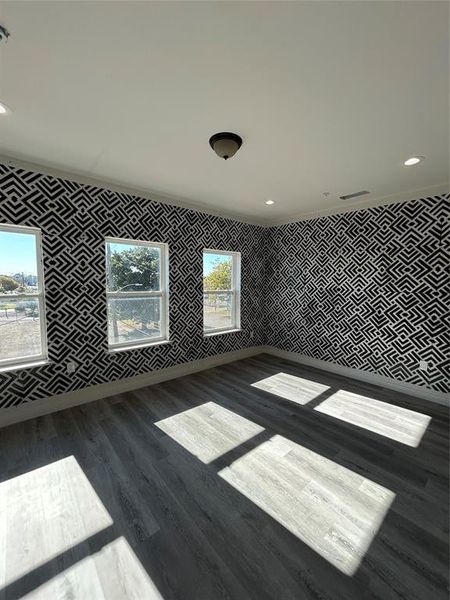 Unfurnished room with recessed lighting and dark wood-type flooring
