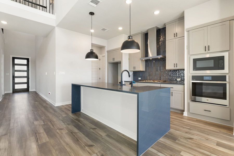 Furnished interior view inside a new home in Lagos Reserve, Manor (Image 11).