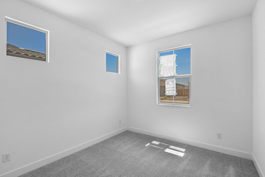 Spacious, unfurnished interior of a new home in CantaMia at Estrella 55+, Goodyear (Image 20).