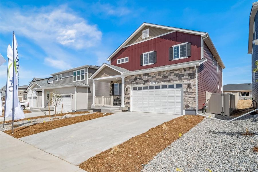 Front exterior of a new home in , Aurora, CO, highlighting curb appeal (Image 1).
