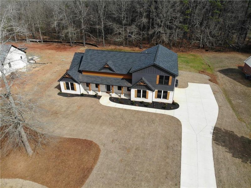 Front exterior of a new home in , Covington, GA, highlighting curb appeal (Image 26).
