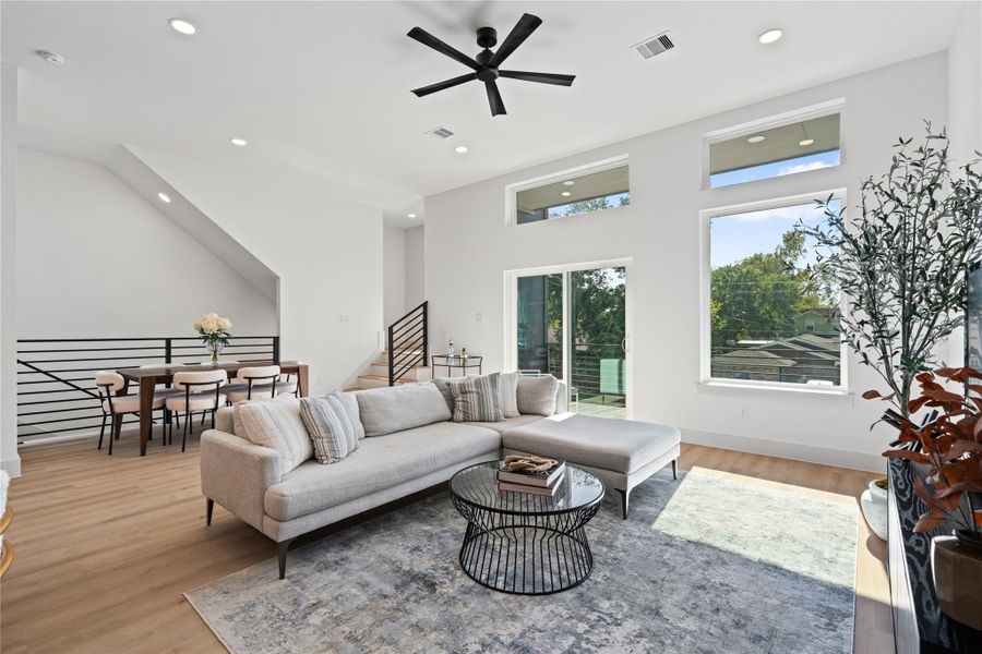 A bright living space that transitions naturally to the covered balcony for easy indoor-outdoor living. A bright living space that transitions naturally to the covered balcony for easy indoor-outdoor living.