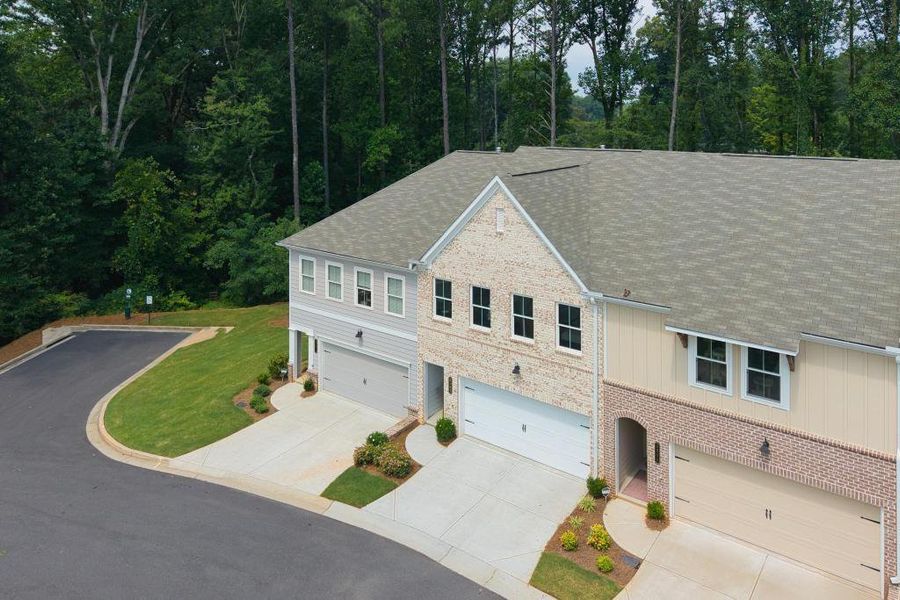 Front exterior of a new home in , Kennesaw, GA, highlighting curb appeal (Image 25).