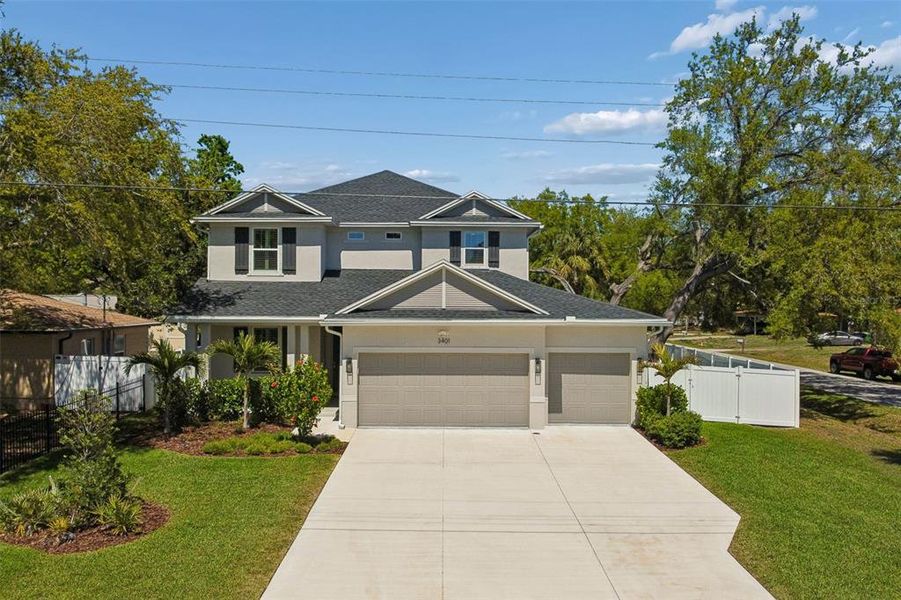 Front exterior of a new home in , Tampa, FL, highlighting curb appeal (Image 23).