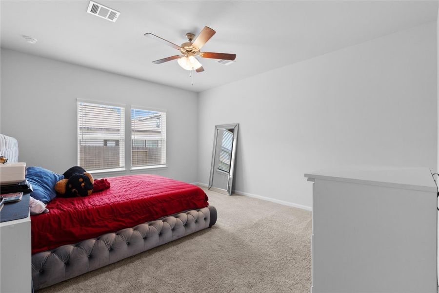 Furnished interior view inside a new home in Lakes at Black Oak, Magnolia (Image 15).
