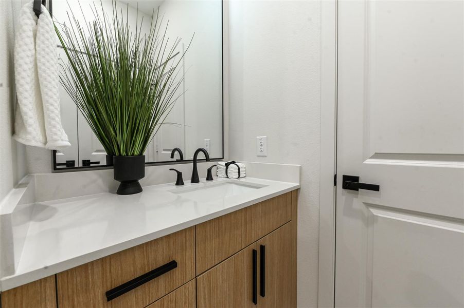 Secondary bathroom. Each with its own separate vanity