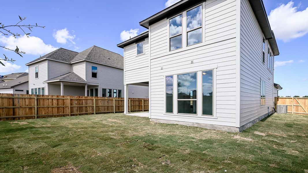 Exterior details and patio area of a home in The Parklands, Schertz (Image 17).