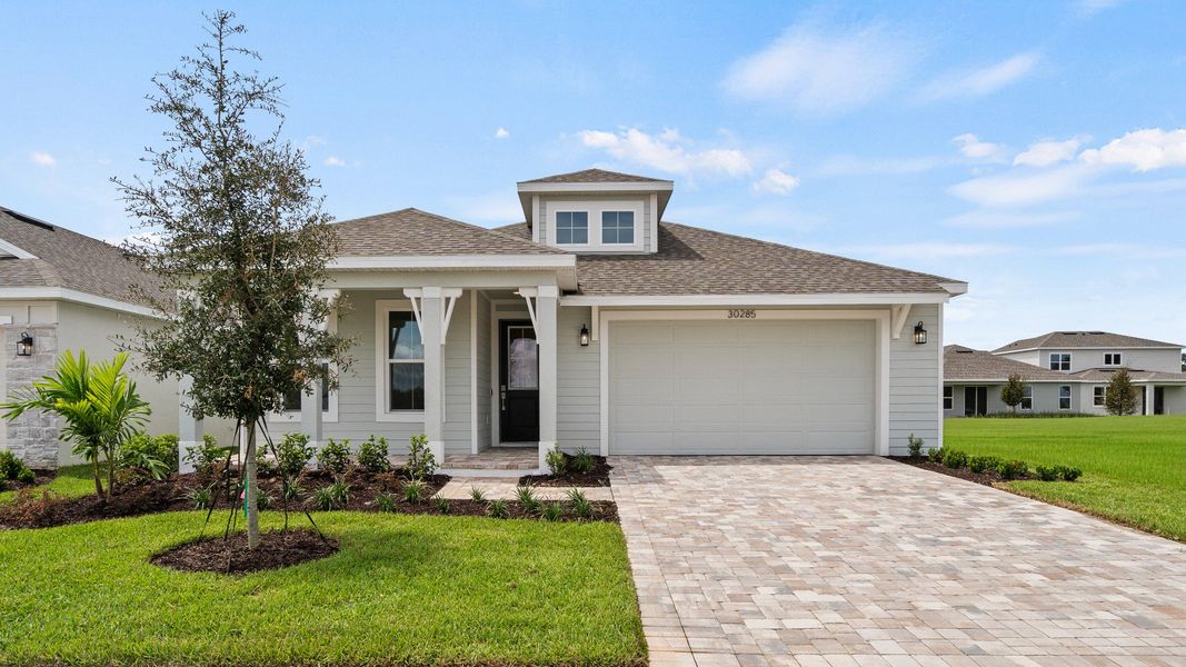 Front Exterior of the Buttonwood by DRB Homes in Trailside located in Mount Dora, FL.