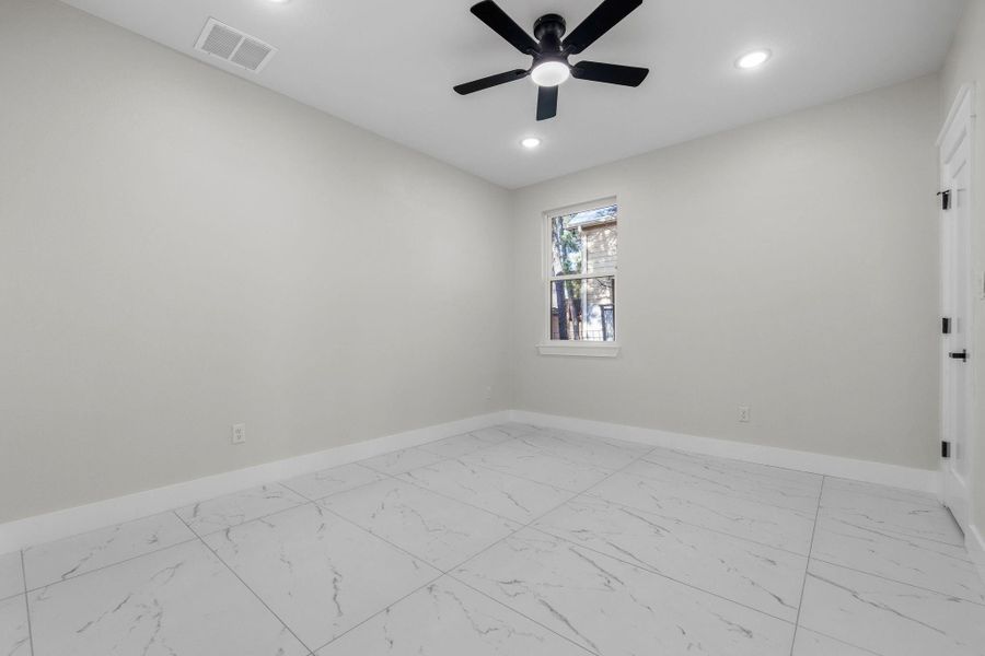 Unfurnished room with ceiling fan