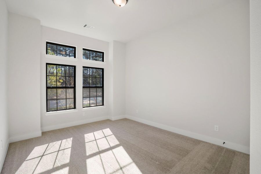 Spacious, unfurnished interior of a new home in The Woodlands Hills, Willis (Image 28).