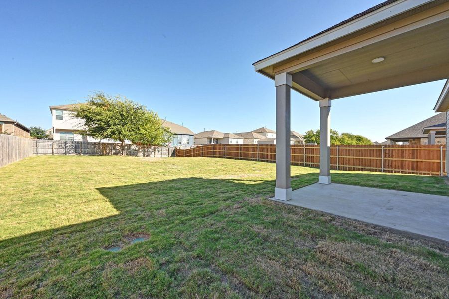 Exterior details and patio area of a home in Salerno - Classic Collection, Round Rock (Image 4).