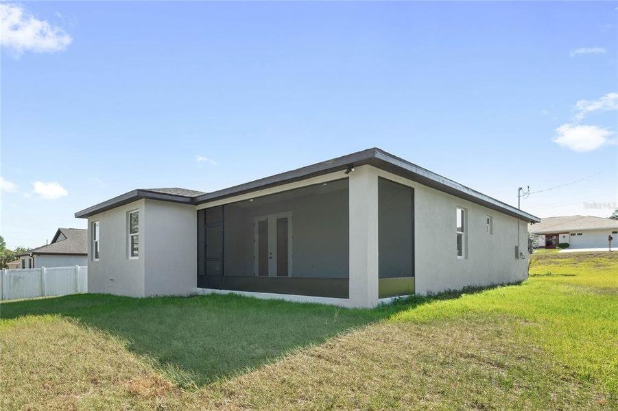 Exterior details and patio area of a home in , Spring Hill (Image 3).