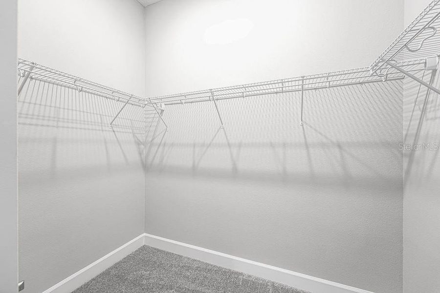 Spacious, unfurnished interior of a new home in Esplanade at Center Lake Ranch, St. Cloud (Image 18).