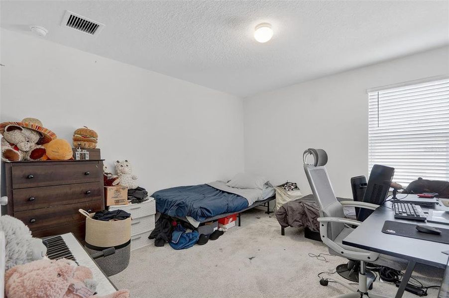 Furnished interior view inside a new home in The Reserve at Lake Ridge, Minneola (Image 34).